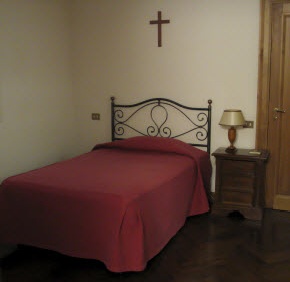 The bedroom of a cardinal-elector (click on the pic to see the article at Catholic Review)